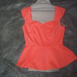 womens neon strappy back peplem blouse. size medium